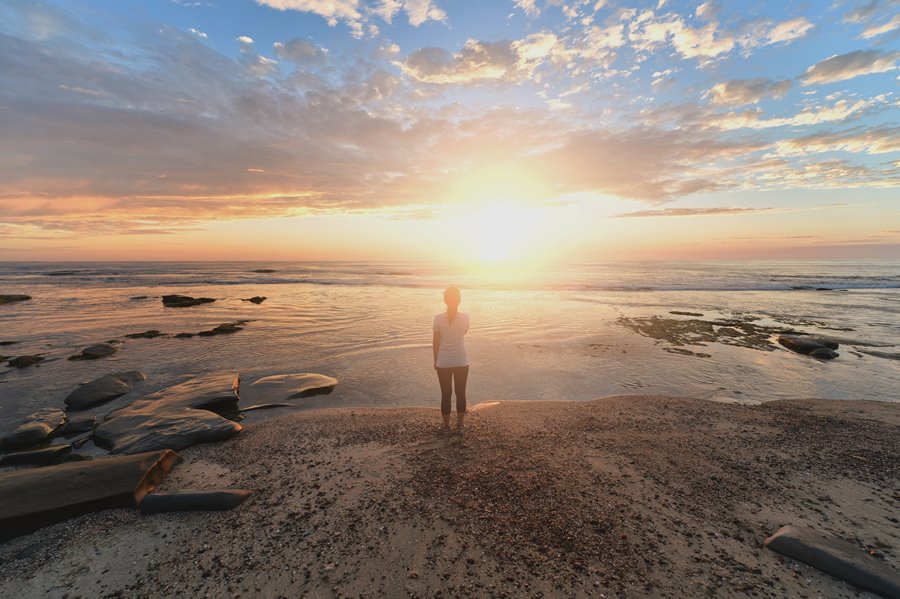 woman watching sunset