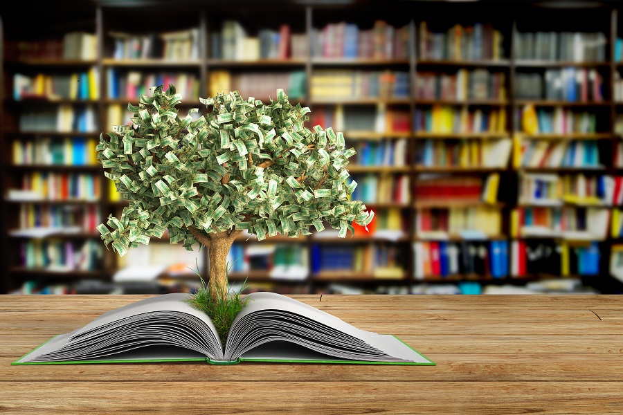 tree growing from book